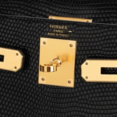 Hermès Kelly 28 Black Niloticus Lizard logo1